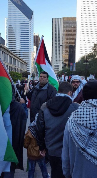Palestinians and protestors proudly waved Palestinian flags at the protest in Chicago Sunday Oct. 18, 2015 against Israel's occupation. Photo courtesy of Dr. Atiyeh Salem