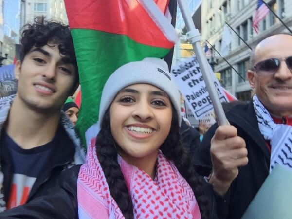 Protestors proudly wave Palestinian flags against Israeli injustice, demanding and end to the occupation. Protest in Chicago Sunday Oct. 18, 2015 against Israel's occupation. Photo courtesy of Dr. Atiyeh Salem