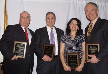 Mnsour Tadros (left) joins Daily Herald Newspaper Columnist Burt Constable, American Arab journalist Amani Ghouleh, and WBBM TV Reporter Jay Levin in receiving Excellence in Journalism Awards from the Chicago Chapter of ADC in 2010