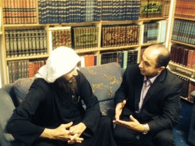 Author writer Ali Younes (right) interviews Abu Mohamad Al Maqdisi in Amman, Jordan