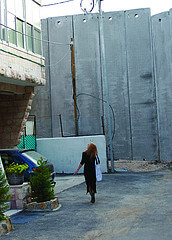 Eileen Fleming at The Wall in Bethlehem, copyright Meir Vanunu, 2007