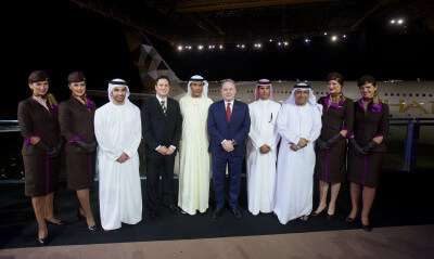 (Left to right all Etihad Airways) Hareb Al Muhairy, VP UAE; Peter Baumgartner, Chief Commercial Officer; Abdul Qader Hussein Ahmed, VP Government and International Affairs; James Hogan, President and Chief Executive Officer; Khaled Al Mehairbi, SVP Government and Aeropolitical Affairs; Hasan Al Hammadi, SVP Executive Affairs; with members of the airline's cabin crew, in front of Etihad Airways' first A380. (PRNewsFoto/Etihad Airways)