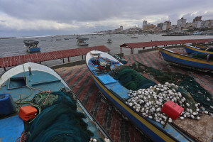 Gaza Port prepares for heavy storms. Israel has blocked financial and material aid from entering the coastal strip. Photo Copyright (C) 2015 Mohammed Asad. All Rights Reserved. Permission to republish given with full credit to Mohammed Asad and The Arab Daily News.