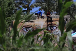 Eyes painted on destroyed homes in the Gaza Strip. Copyright (c) 2015 Mohammed Asad. All Rights Reserved. Permission to republish given with full credit to Mohammed Asad and The Arab Daily News.