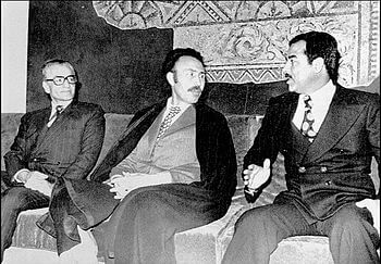 English: Mohammad Reza Pahlavi met Houari Boum...