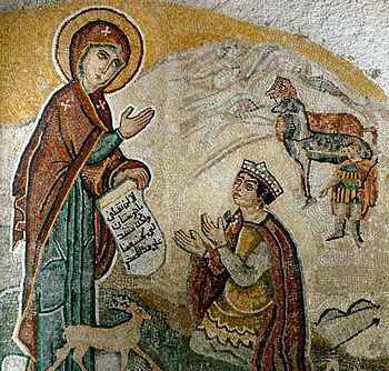 Mosaic depiction of Mary holding an Arabic tex...