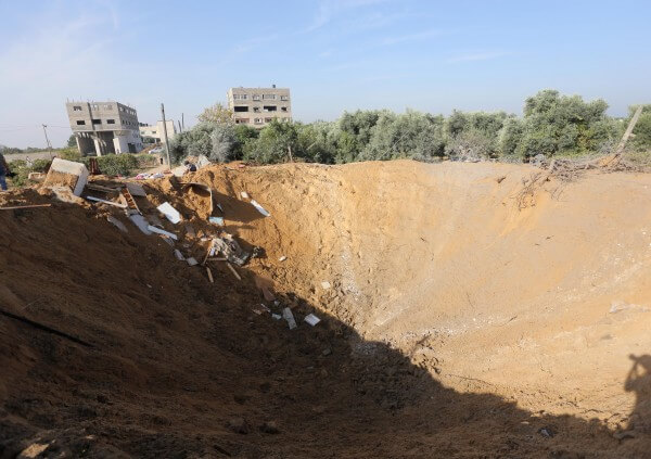 Crater next to the home of the Hassan family in Zeitoun, Gaza Strip which was destroyed during Israeli terrorism attacks early Sunday morning Oct. 11, 2015. he mother, her unborn child and a 4 year old daughter were killed. Copyright (C) 2015 Mohammed Asad. All Rights Reserved.