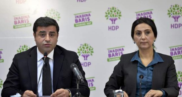 Co-chairs of the pro-Kurdish Peoples' Democratic Party (HDP), Selahattin Demirtas (L) and Figen Yuksekdag hold a news conference in Ankara, Turkey, November 1, 2015. Turkey looked set to return to single-party rule after the Islamist-rooted AK Party swept to an unexpected victory in elections on Sunday, an outcome that will boost the power of President Tayyip Erdogan but may sharpen deep social divisions.   REUTERS/Stringer/Turkey