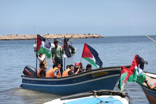 Palestinians commemorate the 6th Anniversary of the Israeli terrorist attack against non-violent civilian protestors aboard the Mavi Marmara during ceremonies in the Gaza Strip, May 30, 2016. Photos Copyright Mohammed Asad 2016, All Rights Reserved.