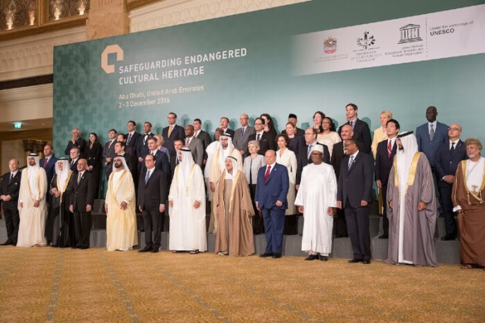 ABU DHABI, UNITED ARAB EMIRATES - December 03, 2016: (front row L-R) HH Prince Aga Khan IV, HH Sheikh Jassim bin Hamad Al Thani Personal Representative of the Emir Qatar, HRH Prince Khalid al Faisal Advisor to the Custodian of the Two Holy Mosques and Governor of Makkah Region, HE Ashraf Ghani President of the Islamic Republic of Afghanistan, HH Sheikh Mohamed bin Rashid Al Maktoum, Vice-President, Prime Minister of the UAE, Ruler of Dubai and Minister of Defence, HE Francois Hollande, President of France, HH Sheikh Mohamed bin Zayed Al Nahyan, Crown Prince of Abu Dhabi and Deputy Supreme Commander of the UAE Armed Forces, HH Sheikh Sabah Al Ahmad Al Jaber Al Sabah Emir of Kuwait, HE Abdrabbuh Mansour, Hadi President of Yemen, HE Ibrahim Boubacar Keita, President of Mali, HE Hailemariam Desalegn Prime Minister of Ethiopia, HH Sheikh Nasser bin Hamad bin Isa Al Khalifa, HE Yusuf bin Alawi bin Abdullah Foreign Minister of Oman (R), (2nd row) HE Alexis Tsipras, Prime Minister of Greece (3rd L), HE Denis Zvizdic, Chairman of the Council of Ministers of Bosnia and Herzegovina (4th L), HE Jack Lang President of Institut  du Monde Arabe (5th L), HE Mohamed Khalifa Al Mubarak Chairman of Abu Dhabi Tourism & Culture Authority (6th L), HE Irina Bokova Director General of UNESCO (7th L) and other dignitaries, stand for a photograph during the Safeguarding Endangered Cultural Heritage Conference at Emirates Palace. (PRNewsFoto/Abu Dhabi Tourism & Culture Auth)