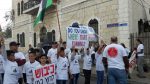 Dozens of Israelis, Palestinians protest Jerusalem Marathon