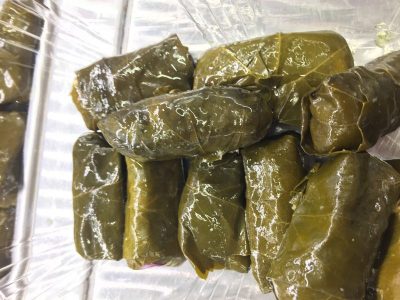 Greek Dolmades, stuffed grape leaves served cold, drenched in olive oil and without any meat. Photo courtesy of Ray Hanania