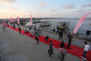 The 3rd Annual Red Carpet Festival in the Gaza Strip remembers major moments in Palestinian history, launched in 2015 marking the Israeli destruction of civilian homes in al-Shajaiya neighborhood east of Gaza City. Photo copyright Mohammed Asad. All Rights Reserved.