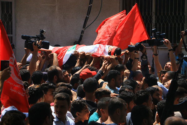 Pictures of the day of the funeral of Martyr Mohammed Majid Bakr, 25, who was shot yesterday by the Israeli occupation during his work as a fisherman in the sea of ​​Gaza City Photography- Ahmed Hasaballah.jpg