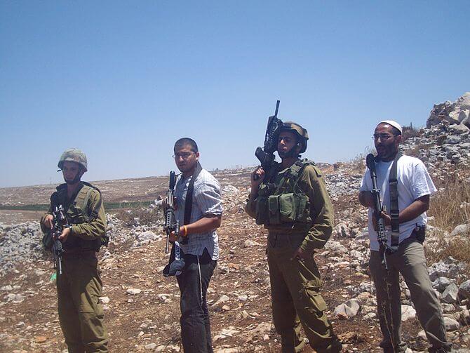 IDF soldiers and Israeli settlers