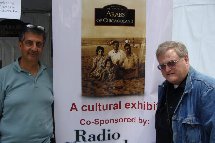Author Ray Hanania with visitors in front of the display at the Arabesque Festival in June 2010 when Richard M. Daley was mayor and before Mayor Rahm Emanuel racistly blocked involvement of Arabs in Chicago life. Photos by Ray Hanania