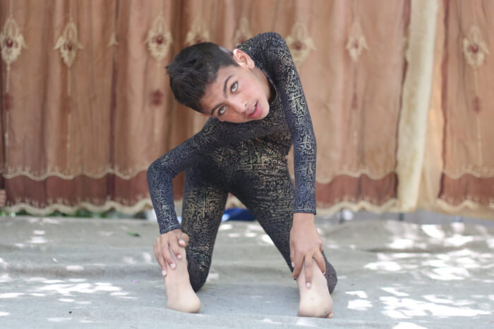 Yousef al-Bahtini, a 12-year-old Palestinian boy from Gaza City, is preparing to enter the Guinness Book of World Records to break a record 20 meters in a body wrapped in a ball in 14 seconds. The test will be held in the Jordanian capital. Photo courtesy of Ahmad Hasaballah
