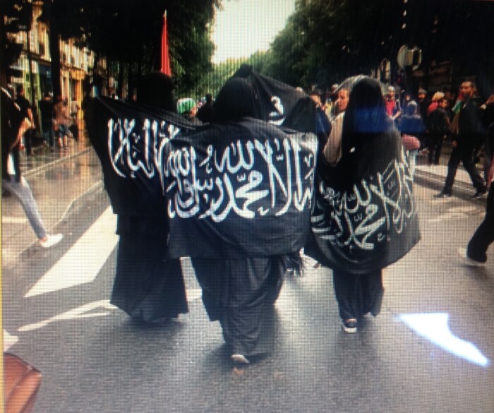 Women in Berqas protesting about ISO at a recent rally in France. Photo courtesy of Abdennour Toumi