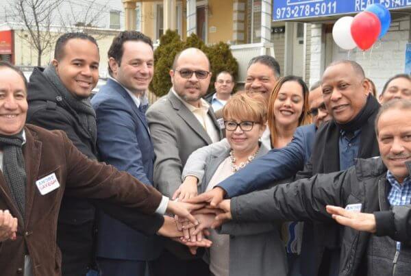 Newly elected Paterson New Jersey Mayor Andre Sayegh with leaders of the city's community. Sayegh won Paterson's mayoral election on Tuesday May 8, 2018. Photo courtesy of the Andre Sayegh campaign