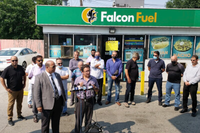 American Arab Chamber of Commerce President Hassan Nijem is joined by Chicago Ald. Raymond Lopez and 25 Arab American business owners who say Mayor Lori Lightfoot is wrongly closing their businesses. Photo courtesy of Ray Hanania