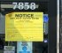 Closure notice posted on the doors and windows of Arab American businesses during Mayor Lori Lightfoot's closure of Arab owned stores in June - Sept. 2021. Photo courtesy of Ray Hanania