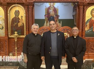 American Arab Chamber of Commerce President Hassan Nijem joins leaders of St. George Antiochian Orthodox Church in Cicero at a tax refund workshop Oct. 31, 2021 in which parishioners received more than $89,000 in property tax refunds for overpayments.