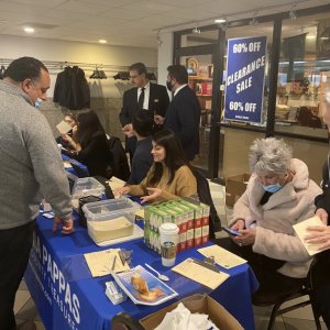 Cook County Treasurer Maria Pappas examines documents to help property tax owners recover more than $100 million in tax overpayments from Cook County. Pappas organized a workshop with the American Arab Chamber of Commerce at St. George Church on Oct. 31, 2021