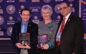 Ald. Raymond Lopez and Cook County Treasurer Maria Pappas receive the American Arab Chamber of Commerce 2021 Action Award from Hassan Nijem for their support of the Arab and Muslim American community, 