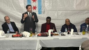 Alderman Raymond Lopez addresses the gathering during an Iftar hosted by Radi Abuhashish on Thursday, April 21, 2022, joined by Dr. Willie Wilson and other Chicago mayoral candidates.