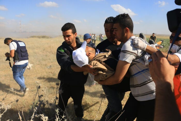 Palestinians injured while protesting in support of hunger strikers at the Gaza border with Nahal Oz. Photo copyright Gaza Strip Photographer Ahmad Hasaballah